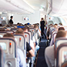 The interior of an airliner with passengers traveling during the holiday season