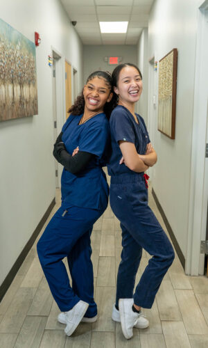 Two Swift Health Morrow team members smiling brightly