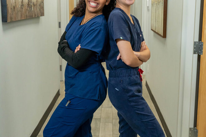 Two Swift Health Morrow team members smiling brightly
